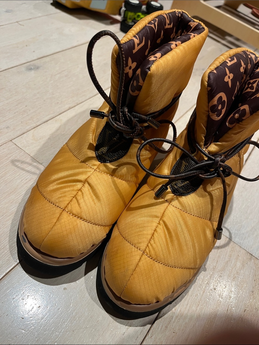 Louis Vuitton women’s Mustard Yellow Quilted Monogram-Lined Boots Sz 36